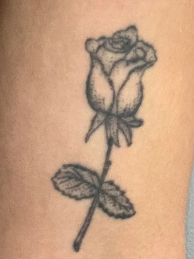 Small Black tattoo on Forearm